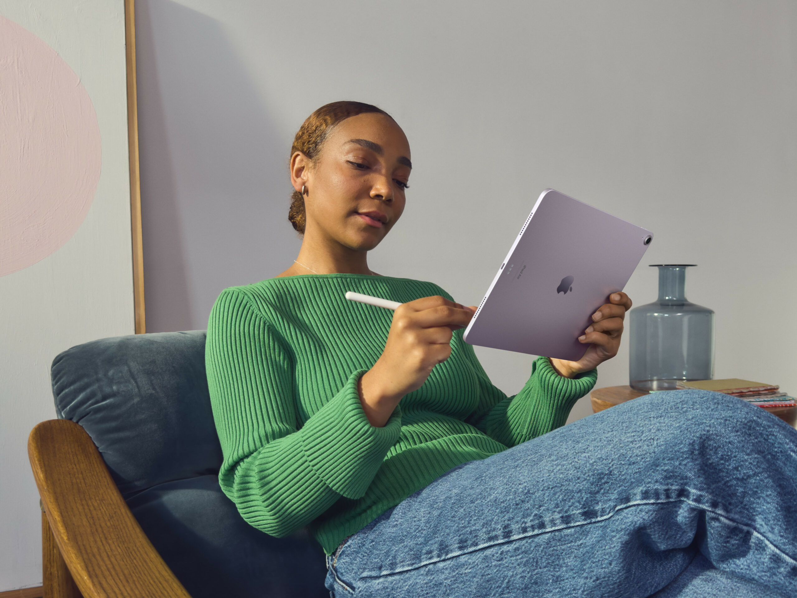User casually using an iPad Air
